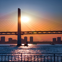 Image of bay bridge at sunset in Japan